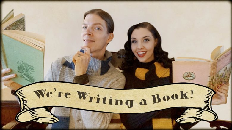 Vintage couple writing a book